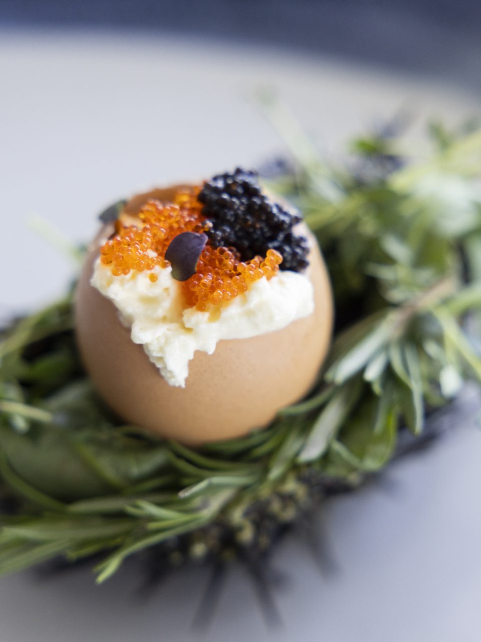 Premium caviar presented with traditional accompaniments